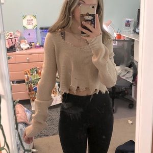 Distressed sweater